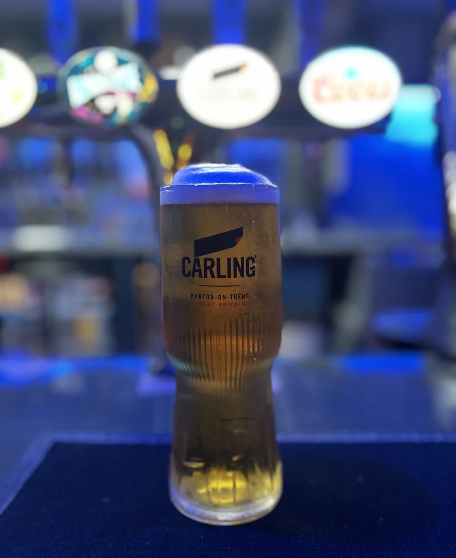 A drink at the illuminated bar at Ashby Bowl